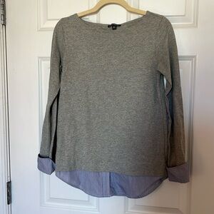 Tunic length top with faux hem and cuffs